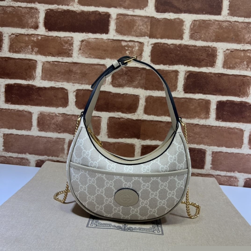 G*u*i top handle bags